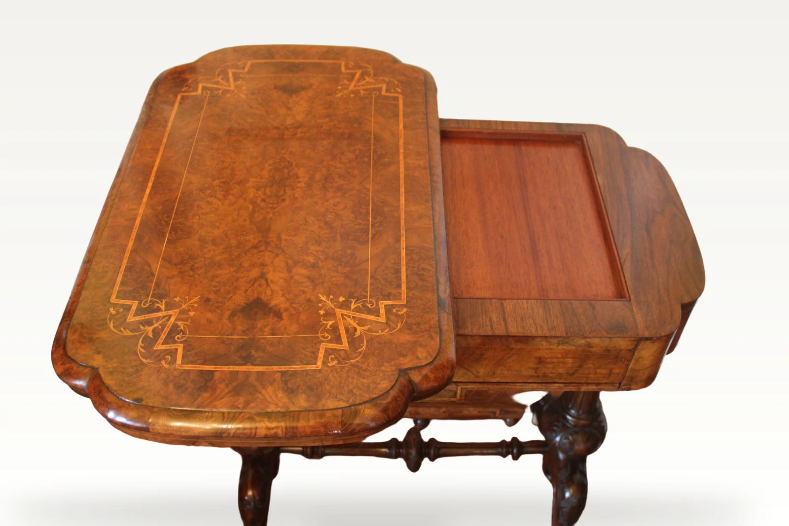A Victorian burr walnut games sewing table — view 5