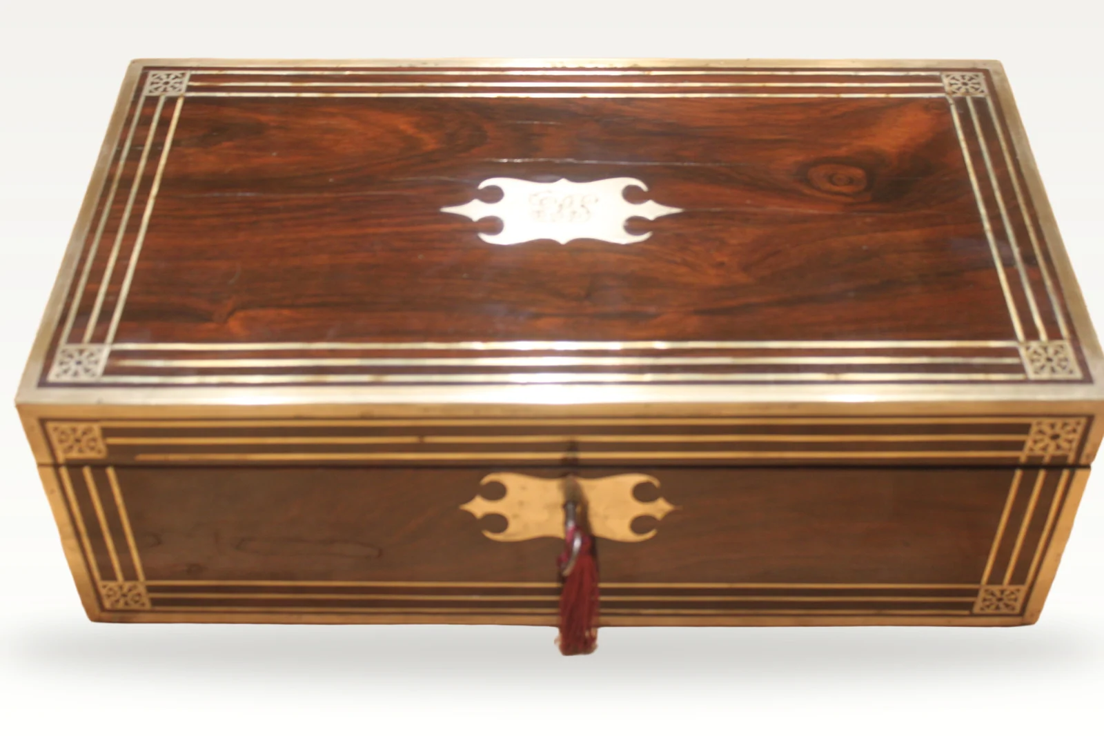 A substantial and impressive late Georgian rosewood and brass inlaid writing slo