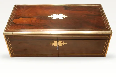 A large 19th century rosewood writing slope with brass inlay