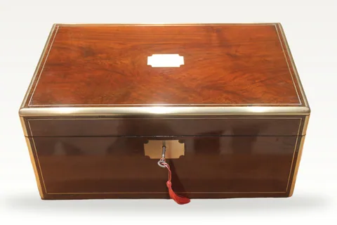 Victorian walnut and brass bound writing slope with secret drawers