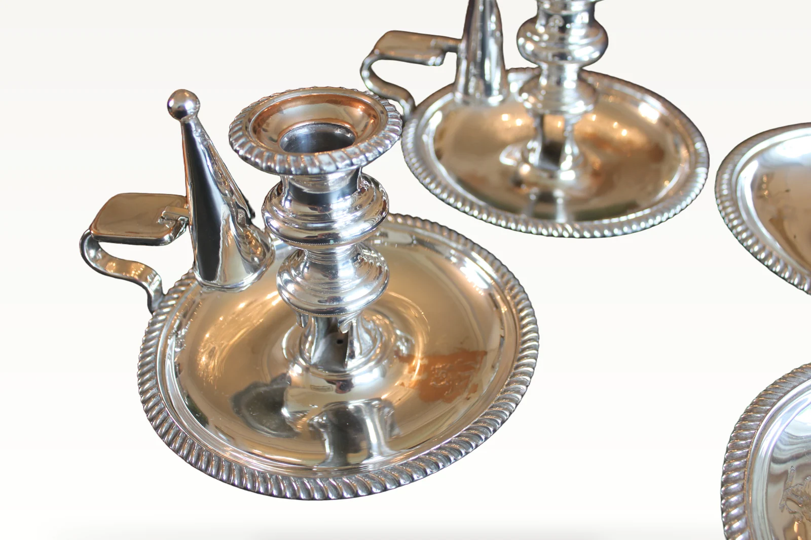 A rare set of four early 19th century silver plated chamber sticks — view 4