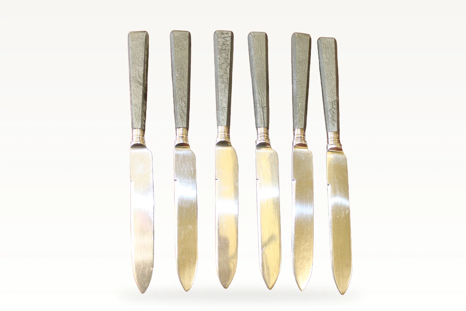 A set of six silver fruit knives