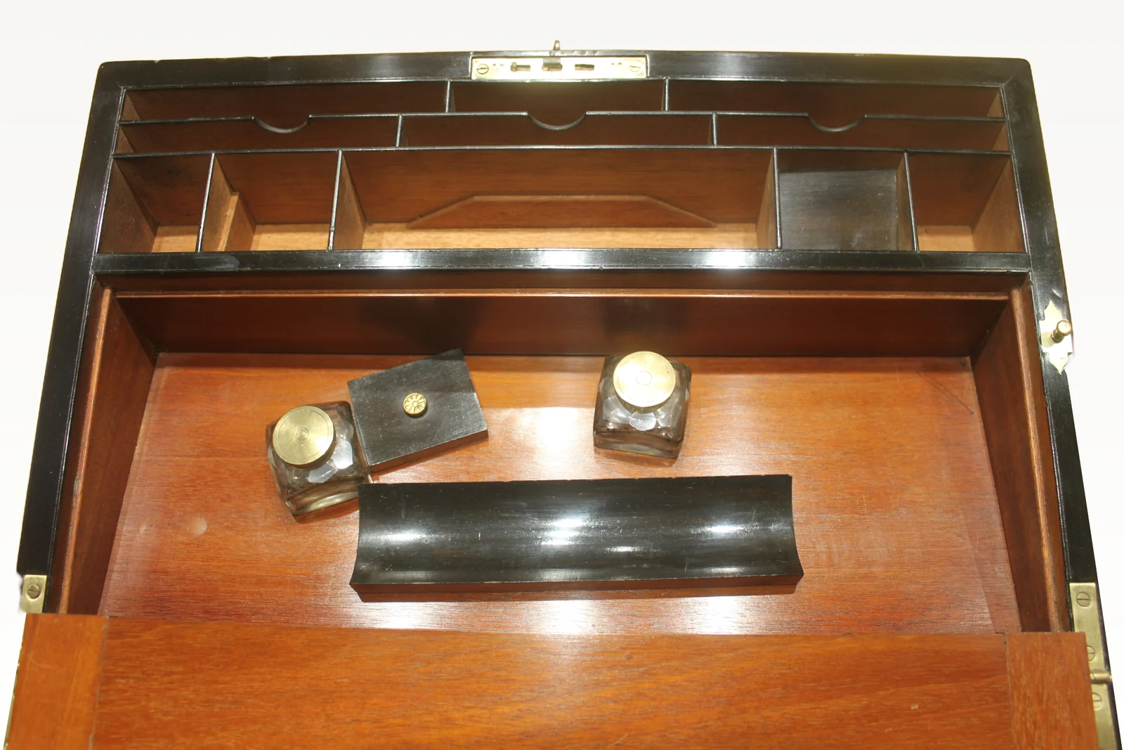 A large and impressive figured walnut and brass bound writing slope with secret — view 9
