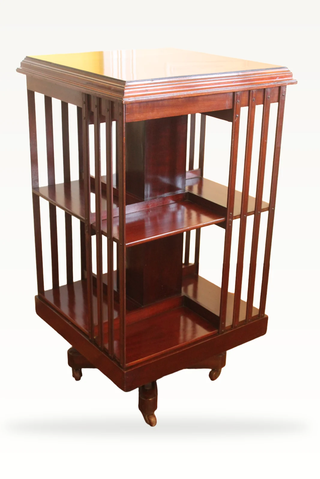 Edwardian mahogany and inlaid revolving bookcase