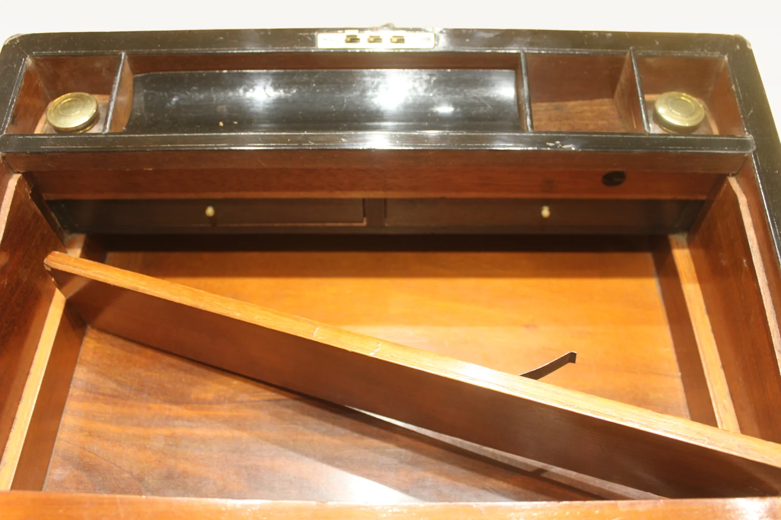 Victorian walnut and brass bound writing slope with secret drawers — view 9