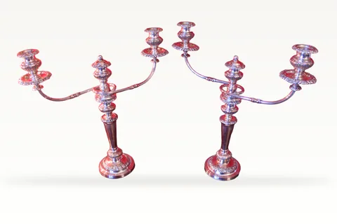 A pair of George III Old Sheffield Plate candelabra